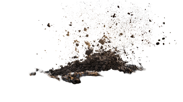 Brown granular explosion against black. Bits of light, dark, and vibrant colors