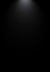 Sleek black surface with subtle texture and moody lighting for a dramatic and modern backdrop or background effect