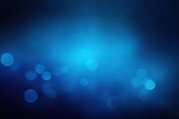 abstract blue bokeh lights creating a soft glowing atmospheric effect with blurred circular light spots