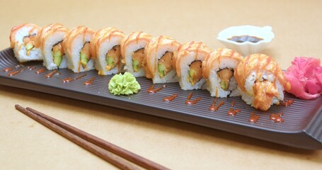 Delicious Salmon Sushi Rolls Served on a Black Plate