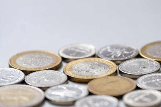 Various Timor Leste centavo coins isolated on white background