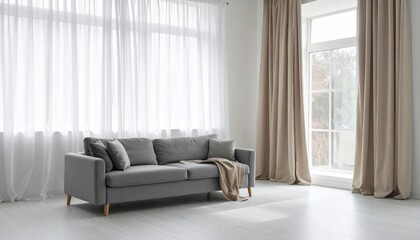 Fototapeta premium Minimalist living room design with gray sofa, curtains, and natural light flowing through windows