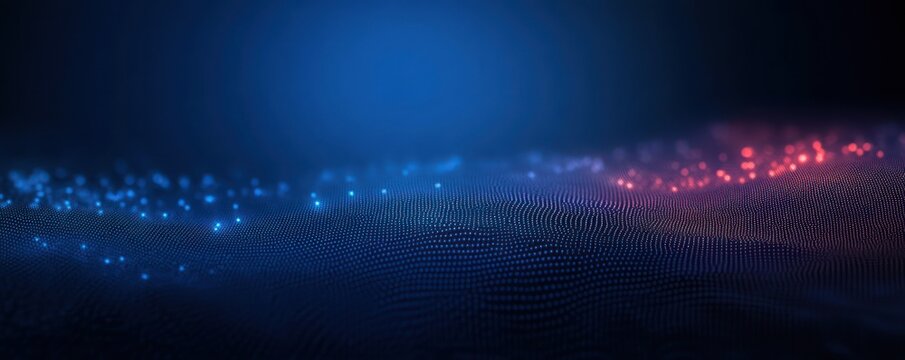 Abstract digital wave composed of blue and red glowing particles creating a sense of flow and depth in a dark background