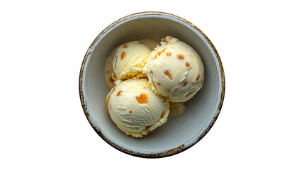 Overhead view of two scoops of butterscotch ice cream in a ceramic bowl