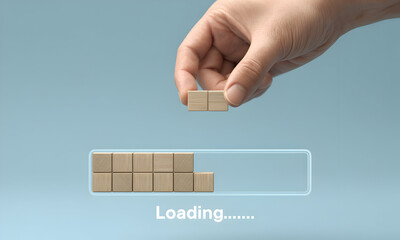 Completing loading bar with hand placing blocks for modern website concept