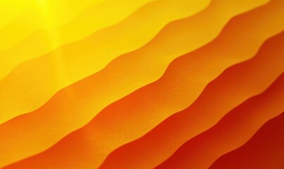 Close-up of layered paper waves in shades of yellow and orange creating a warm, flowing abstract pattern