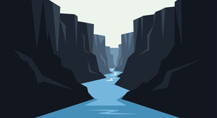 A vast deep canyon with steep dark rock walls and a winding blue river flowing through it
