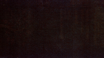 Elegant black background with vintage distressed grunge texture and dark gray charcoal color paint, black stone or concrete wall, black banner. Dark background with grunge texture and worn finish