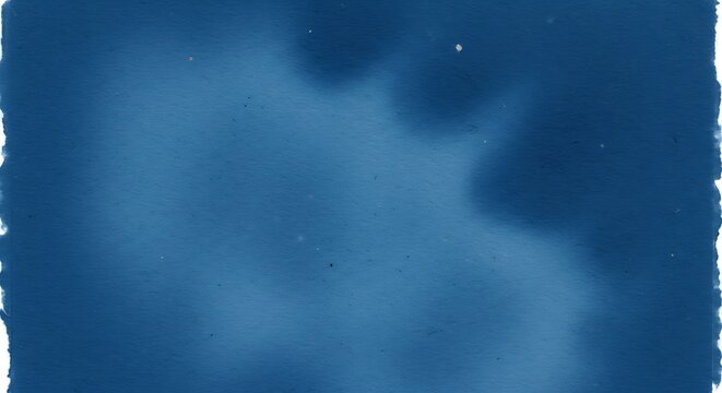 Cyanotype print with abstract shapes and textures on handmade paper