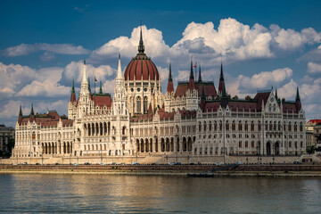 Fototapeta premium Panorama of Budapest with Danube and Parliament. Gothic architectural in Budapest. Historic landmark and national symbol of Hungary on Danube. Tourism with Hungarian Parliament view.