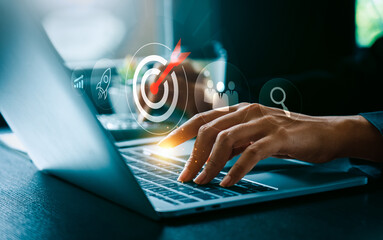 Business goal and digital strategy success concept with businessman typing on laptop computer and...