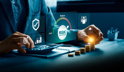 Risk management and financial strategy concept with businessman analyzing investment data and protecting assets, using calculator, digital dashboard to evaluate low, medium, high business risk levels