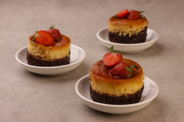 Brownies Cheese Caramel Cake Topping With Strawberry. 