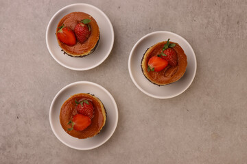 Brownies Cheese Caramel Cake Topping With Strawberry. 