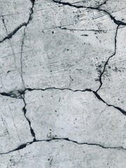 Obraz premium cracked plaster cement floor taken from the top angle