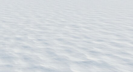 White windblown snow covers a vast undulating landscape