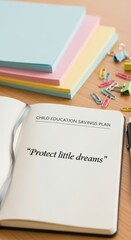 Notebook open on wooden desk promoting a Child Education Savings Plan