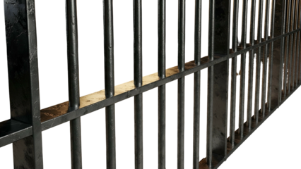 Close Up of Metal Jail Bars with Wooden Support in Prison Cell