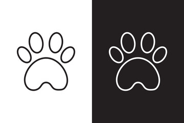 Paw print silhouette on black and white background.