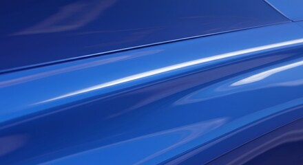 A closeup on a glossy blue surface possibly a vehicle reflecting light with a smooth flowing appearance