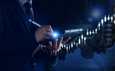 businessman or trader showing a growing virtual hologram stock, indicating an investment in...