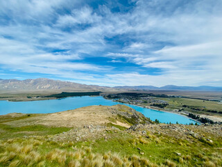 Panoramic View of Lake Tekapo, Turquoise Water, and Tekapo Town from High Vantage Point, New Zealand