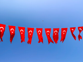 Turkish flags hanging across the sky over Taksim Square in Istanbul