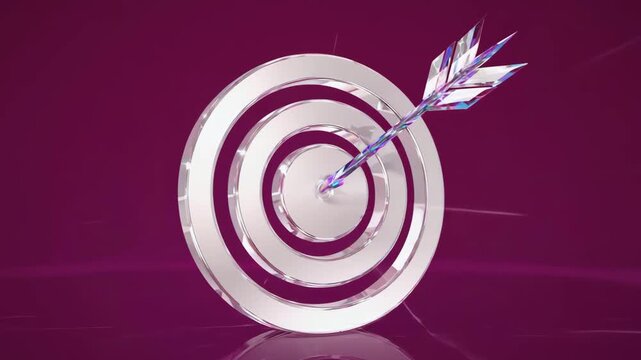 Chrome target symbol with a shimmering diamond arrow hitting the exact center, representing business success and achievement.