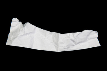 White paper cut with torn edges isolated on black background.