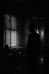Film Noir Black and White Portrait of a Man in Hat with Light Through the Blinds