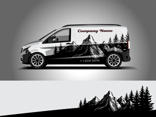 Black and white van wrap with mountain landscape and pine forest silhouette. Perfect for adventure, travel, or outdoor-themed company branding. Editable vector EPS format included. © Wrapin