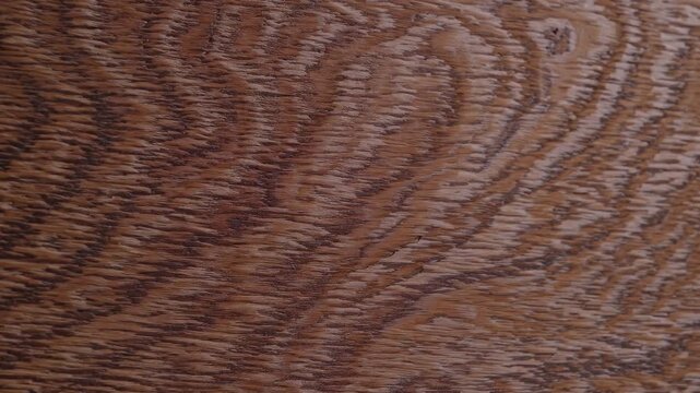 Stop motion footage highlighting natural brown wood grain rich textures surface patterns ideal interior design rustic themes organic background visuals crisp 4K