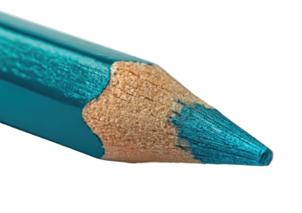 Sharpened teal pencil point close-up on stark black background