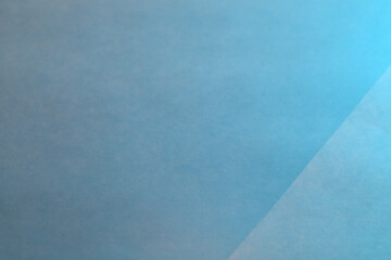Light Blue Minimal Paper Texture Background. Smooth light blue surface with soft texture and minimal lighting, ideal for clean design or pastel projects.