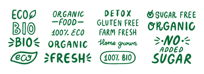 Fototapeta premium eco organic doodle hand drawn inscriptions lettering labels set. lettering text organic, 100 natural, bio, no added sugar and detox. healthy food icon