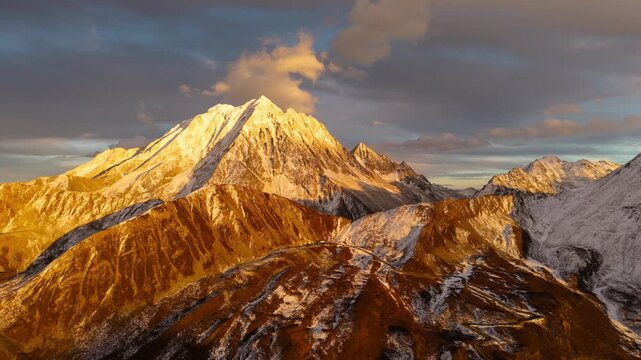 Yala Snow Mountain Sunset Hyperlapse Golden Hour Aerial View of Snow Peaks in Sichuan, China