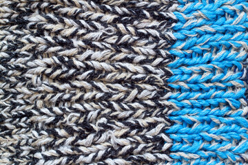 Knitted wool fabric close-up. Surface texture of wool fabric