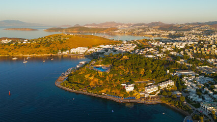 Bodrum, Turkey. Aerial drone view of forested hill with Tiger Tower in bright warm sunlight during morning hours.. Aerial View