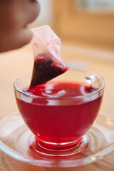 Enjoying a cup of tea with a tea bag infusion