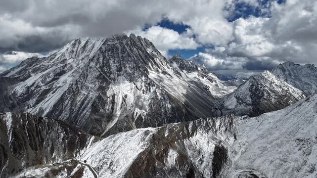 Yala Snow Mountain Hyperlapse Aerial View of Snow Peaks in Sichuan, China