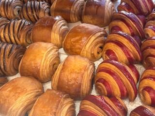 Rows of fresh pastries in a boulangerie