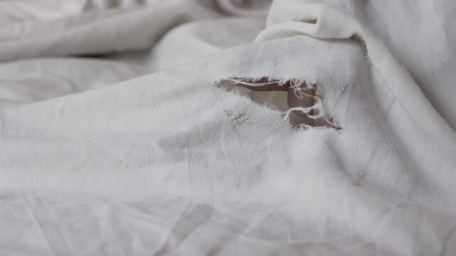 White ripped fabric detail