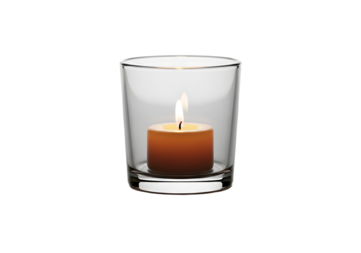 A lit candle in a clear glass holder on a white background.