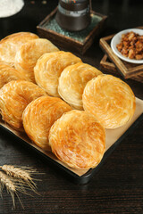 Traditional Shaanxi Tongguan Crispy Layered Pastries Chinese Baked Breakfast Snacks on Wooden Board