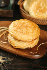 Traditional Chinese Layered Pastry Buns Shaanxi Specialty Bread on Wooden Board