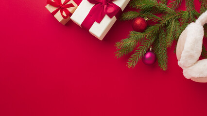 Christmas Gifts and Decorations on Red Background
