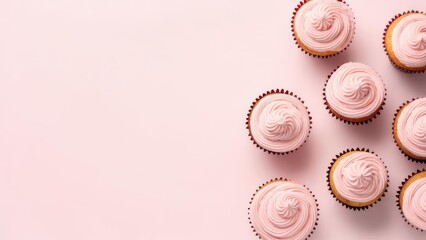 Delicious Pink Frosted Cupcakes Arranged on a Soft Pink Background.