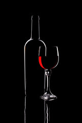 Still life with glass objects on a black background