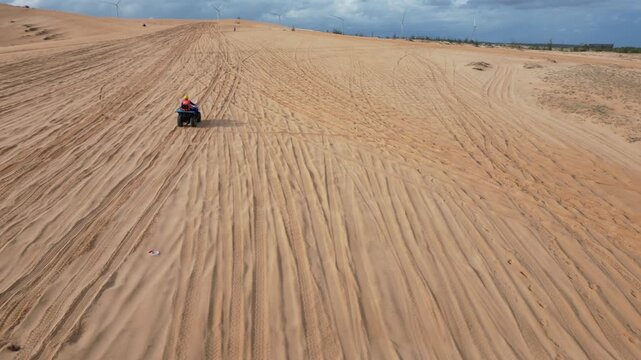 Take a trip to the golden sand dune desert and enjoy 4x4 car dune buggy  sand dune climbing in Mui Ne in South Vietnam on an adventurous trip in Asia