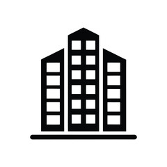 A simple black building features a square window design, creating a modern facade